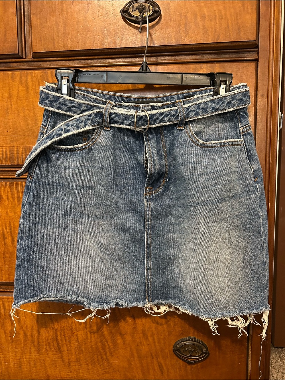 Washed Blue Denim Mini Skirt with Frayed Hem